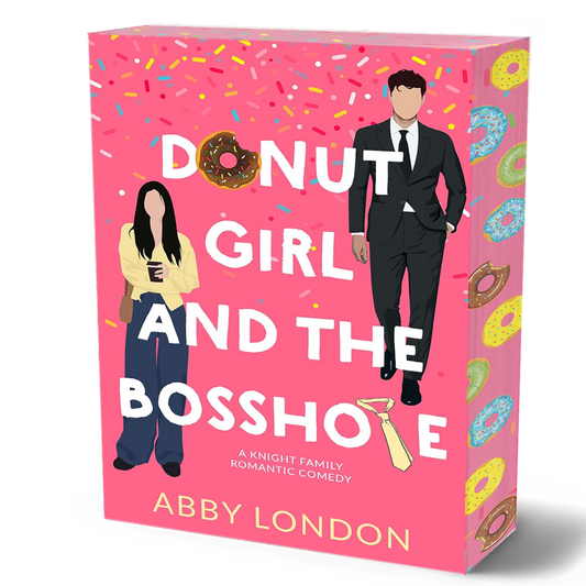 Book cover for 'Donut Girl and the Bosshole' by Abby London, featuring a bright pink background with colorful donut illustrations, large white title text, and illustrated characters of a man in a black suit and a woman in a yellow top and blue pants.